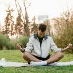person meditating in cozy room